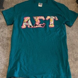 Sorority AST Teal Graphic T-Shirt with Colorful Letters